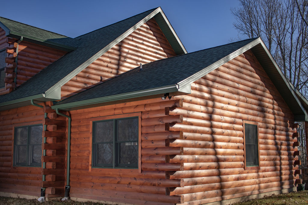 spence log cabin home attached garage