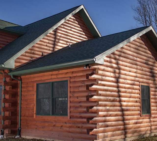 spence log cabin home attached garage