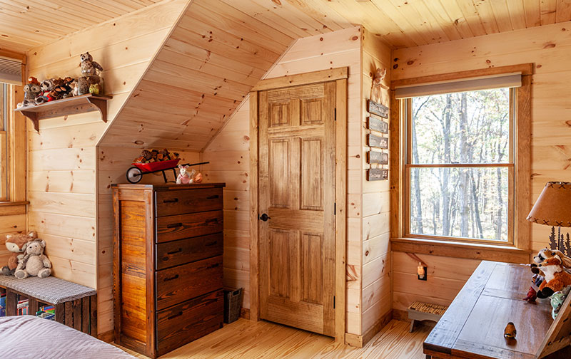 upstairs space in two-story log cabin
