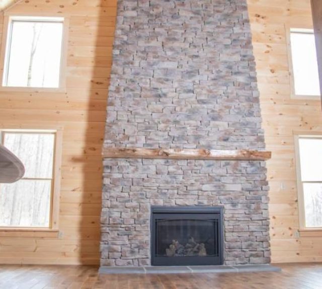 log cabin fireplace made of stone